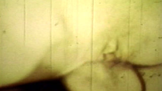 Worn Sepia Loop Captures Curly Retro Couple in Raw Bedroom Passion
