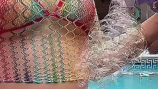 Having Fun with Bubble Maker Nearby Pool