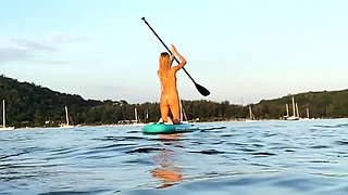 Outdoor solo masturbation scene with curly blonde