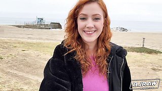 Sexy redhead beauty Cherry Candle is sucking a big cock on the knees