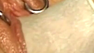 Chained Mature Beauty Receives Deep Gloved Fisting