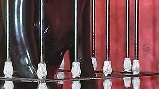 Imprisoned Rubber Slut Has to Give a Blowjob