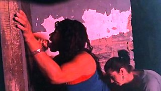 Two Hookers Take Turns Sucking Cock at Gloryhole