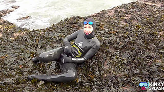 Rubbery Beach Encounter: Lucy's Neoprene Pussy Play with Stranger