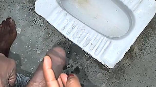 Desi Bhabhi Holding Stepbrother-in-law's Penis and Making Him Pee and Peeing Herself