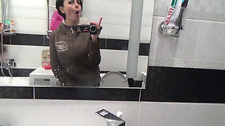 Pissing on the toilet long and a lot after long desperation and a lot of liquids