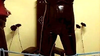The Slave in Latex - Rough BDSM Action with Three People