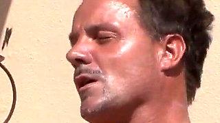 The German granny gets her shaved pussy penetrated by her out-door lover as a spectator witnesses the exciting moment