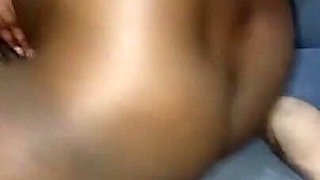 Black Couple Enjoying Sex on Sofa at Night