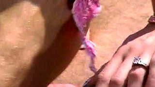 Brunette babe fingered deeply outdoors during a massage