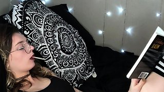 Brunette enjoys the toy on gaping pussy while masturbating