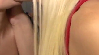 Two blonde girls love to pleasure each other in the car