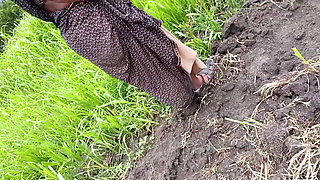The desi daughter-in-law of the village is taking off her clothes in the millet field and showing her finger in her pussy to her father-in-law.