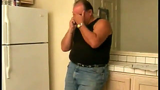 Redheaded granny with huge boobs sucks older dude's cock and then gets a facial