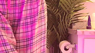 Emily pissing in the bathroom