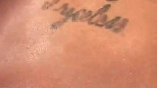 Megan Pryce an ebony slut with tattooed skin and brunette hair fucks with a bbc pounding her pussy