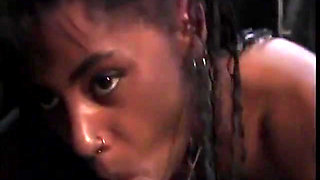 Sexy long haired black girl sucks a big white dick
