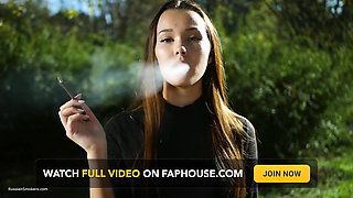 Sweet Sensual Russian Girl Smoking Cigarette Outside