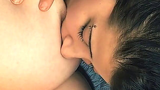 Lesbian Sucking on Huge Tits