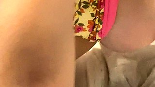 Busty babe playing with her big boobs