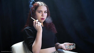Cute Russian Redhead Smoking in Leopard Pants