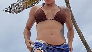 Giant Muscular Goddess on the Beach