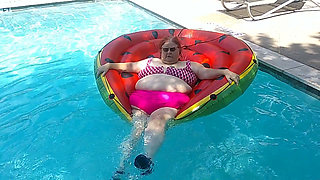 Short Video of BBW Nurse Vicki Floating on Her Huge Watermelon