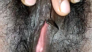 The beautiful girl fingering pussy