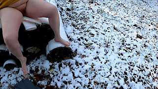 Slapping and Pulling Her Labia in the Snow