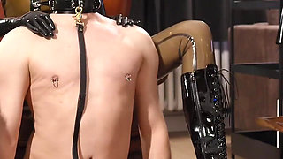 Male Slave Adoring His Mistress' Shiny Boots