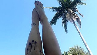 Outdoor solo scene with Ivana masturbating pussy