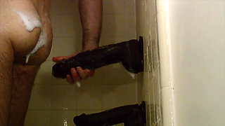 Giant Dildos in His Ass While Showering