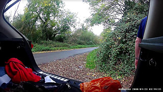 Just getting changed parked at side of road with cars driving past