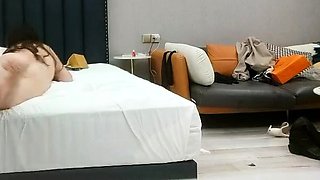 Cute amateur asian web cam girl playing with her toy