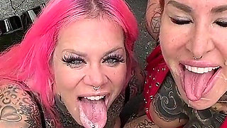 Two Horny Leather Tattoo Sluts Fuck Truck Driver at the Rest Area!