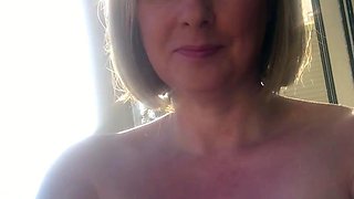 Big Boobed Blonde Masturbates With A Dildo In The Bathroom