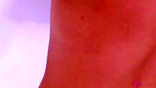 Hot blonde Daniella Margot fucks herself with a finger in the bath