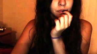 Small titted brunette teen fingering on the bed