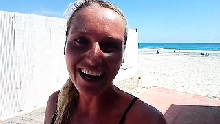 Outdoor solo masturbation scene with curly blonde